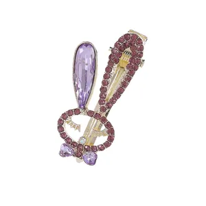 Cute rabbit hair clip with purple crystals and rhinestones for women on white background