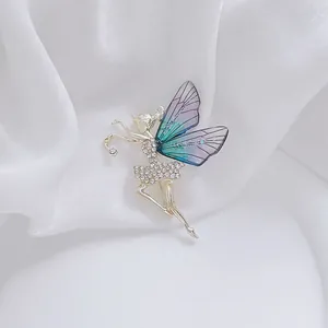 Elegant fairy butterfly brooch with purple gradient wings and sparkling rhinestones
