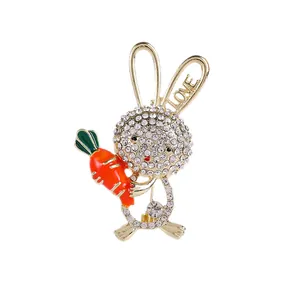 Cute bunny brooch with rhinestones and orange carrot, gold finish rabbit lapel pin