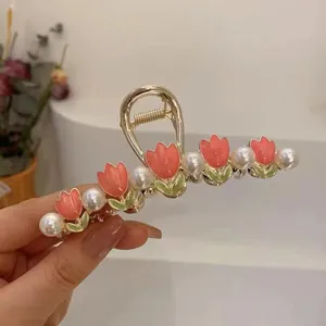 Elegant gold tulip hair claw clip with pink flowers and pearls for women