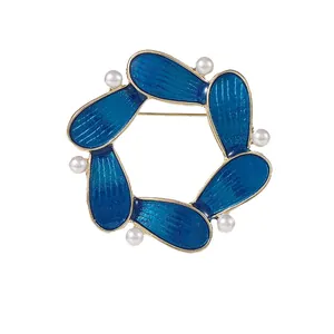 Elegant floral blue enamel wreath brooch with pearls and gold finish for women