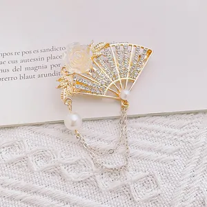 Elegant vintage style fan brooch with white flower, rhinestones and pearls for women