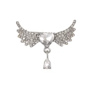 Broche ailes d'ange et cœur avec strass transparents finition argentée pour femmes