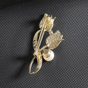 Elegant gold tulip brooch with rhinestones and pearl featuring S925 engraved back pin