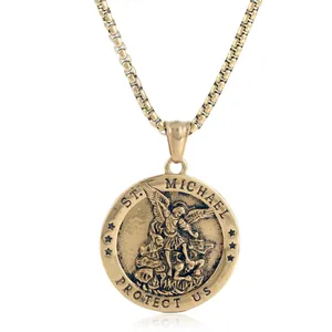 Retro gold St. Michael angel pendant necklace with thick box chain on white background