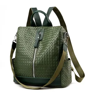 Woven dark green faux leather multi-way backpack for women with silver zippers