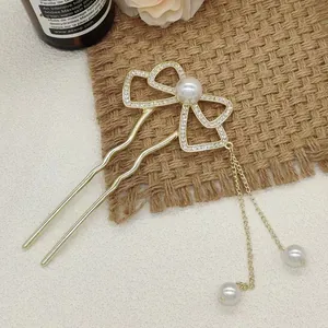 U-förmige goldene Haarnadel mit Strass-Schleife und Perlenquaste für elegante Frisuren