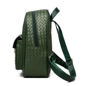 Side view of dark green woven leather backpack featuring adjustable straps and zipper