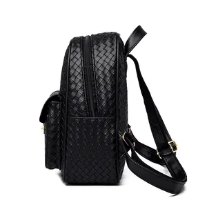 Detail of black woven leather backpack showing side view, main zipper, and gold hardware