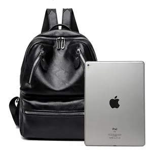Retro black PU leather backpack for women shown with an iPad for size comparison