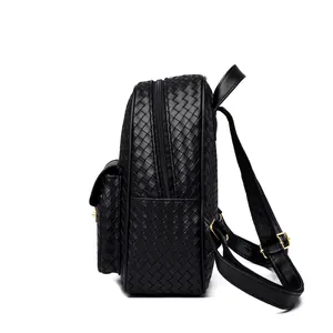 Women's black woven texture PU leather backpack with gold hardware and side view