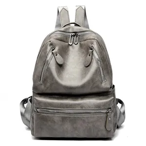 Retro grey PU leather backpack for women with multiple zippers and pebble texture finish