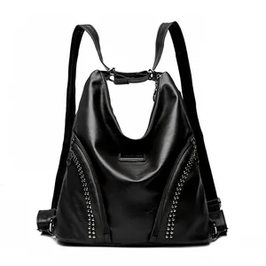 Versatile black PU leather backpack with silver studs and multiple zipper pockets