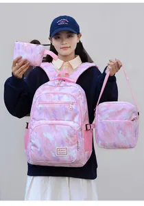 Detailed set of pink camo backpack with matching crossbody lunch bag and pencil case