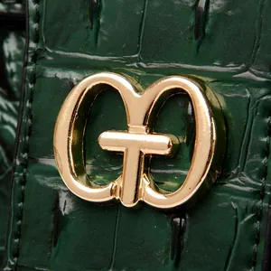 Dark green crocodile pattern leather shoulder bag with a polished golden metal logo