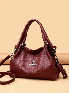 Borsa a mano in pelle bordeaux con logo a canguro e tracolla per donna