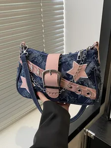 Sac à épaule Y2K en denim avec lanières en cuir rose et broderie d'étoile