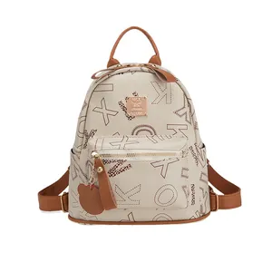 Fashionable mini cream PU backpack with leopard print letters and brown bear charm