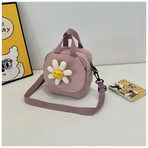 Close-up of lilac mini canvas bag featuring 3D white daisy with yellow smiley face center