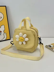 Mini yellow canvas crossbody bag with sunflower design and adjustable strap for girls