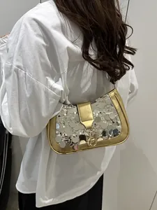 Chic gold sequin baguette shoulder bag for women with metallic strap and flap closure