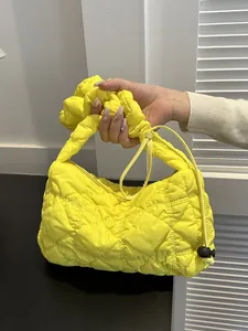 Quilted bright yellow bubble cloud bag with soft nylon texture and ruched shoulder strap
