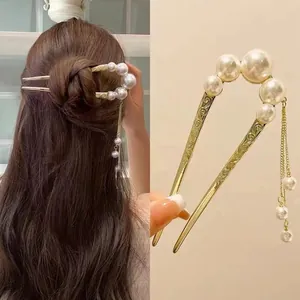 U-shaped hair pin with gradient pearls and long fringe tassel detail for elegant updos