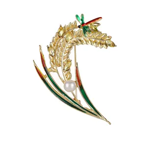Elegante spilla a spiga di grano con cristalli gialli, perla bianca e libellula colorata