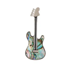 Elegant electric guitar brooch with iridescent abalone shell inlay and silver metal frame