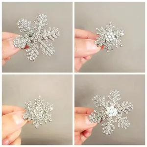 Sparkling silver snowflake hair clips with rhinestones and pearls shown in four styles