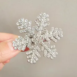 Sparkling snowflake hair clip with rhinestones and silver alloy base for women