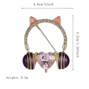 Detailed view of cat ear crystal headphone brooch with dimensions 2.6cm by 3.2cm