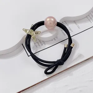 Elastic ponytail holder with pink pearl and gold star charm for elegant hairstyles