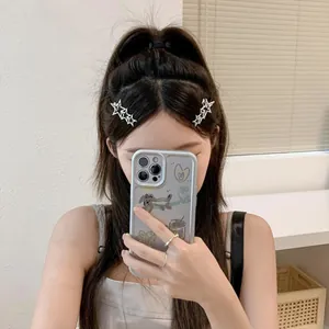 Close-up of a silver hollow star hair clip worn on woman's hair for a stylish look