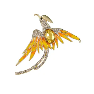 Elegante broche de fénix con alas de esmalte colorido y brillantes diamantes de imitación