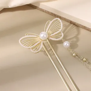 Elegant gold butterfly hair pin with pearls and tassels for traditional Chinese styling
