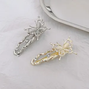 Elegantes pinzas para el cabello de mariposa en metal líquido con piedras de ojo de gato