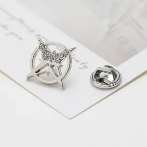 Silver hexagram brooch with crystal rhinestones on a minimalist white display card
