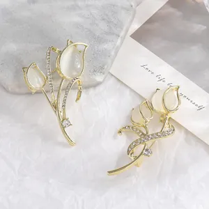 Elegant gold tulip brooch set with opal petals and sparkling rhinestones for women