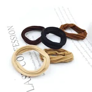 Set of 5 elastic fabric hair ties in earthy tones like black, brown, and beige