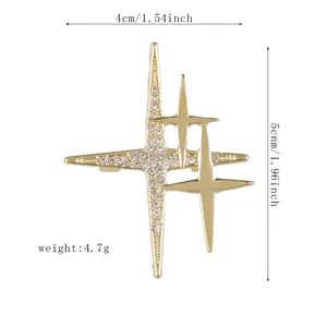 Détail d'une broche étoile dorée avec des dimensions de 4 cm de large et 5 cm de haut