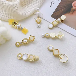 7-piece set of geometric alloy hair clips with opal resin stones and faux pearls