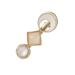 Elegant gold metal hair clip with opal and geometric charms for women fashion styling