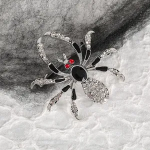 Gothic spider brooch with silver alloy, white rhinestones and black center gem