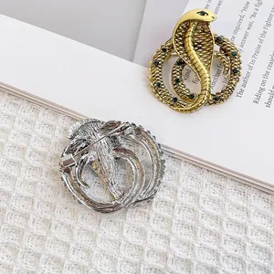 Vintage Kobra-Brosche-Set in Gold und Silber mit grünen Kristallakzenten