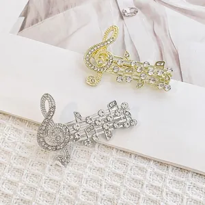 Set di spille a nota musicale in oro e argento con brillanti strass in cristallo lucido