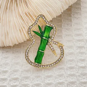 Elegant Chinese style gourd brooch with green bamboo inlay and sparkling rhinestones