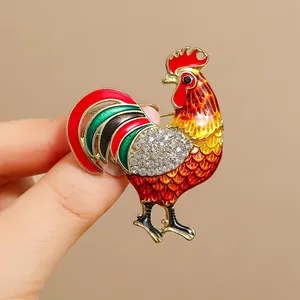 Colorful rooster brooch in gold alloy with enamel paint and sparkling rhinestones