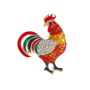 Colorful rooster enamel brooch with sparkling white rhinestones on golden alloy base