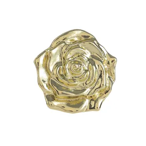 Elegant gold rose flower brooch for women with glossy finish and realistic petal texture
